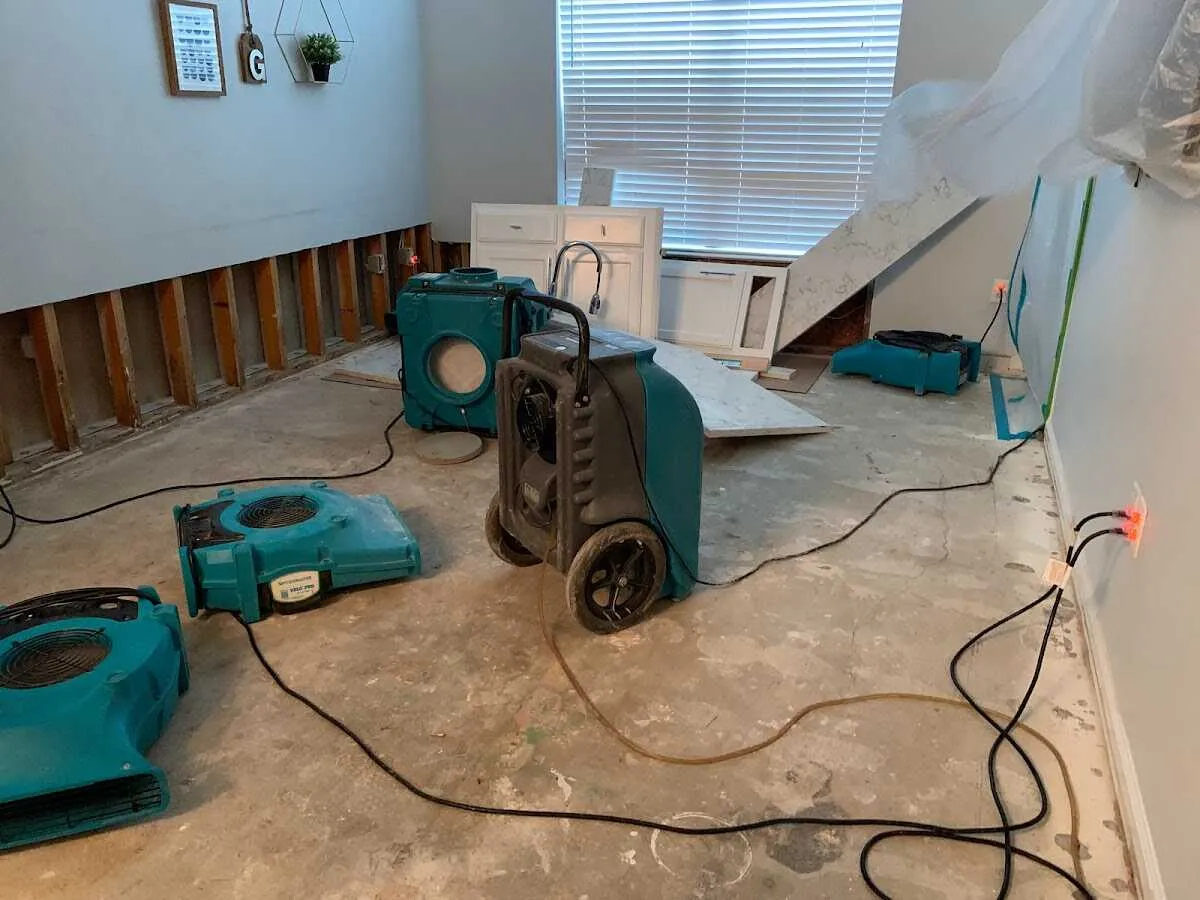 Dehumidifier in flood-cut room for Water Damage Restoration in Richmond Heights
